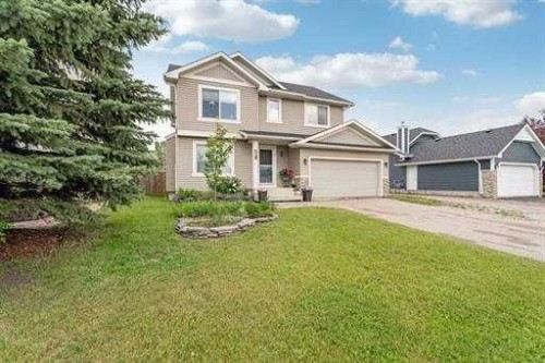 529 Railway Avenue, Langdon, AB - Outdoor With Facade