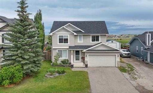 529 Railway Avenue, Langdon, AB - Outdoor With Facade
