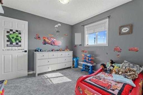 529 Railway Avenue, Langdon, AB - Indoor Photo Showing Bedroom