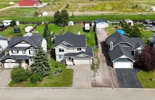 529 Railway Avenue, Langdon, AB - Outdoor With Facade