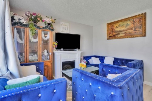 43 Maranda Close Ne, Calgary, AB - Indoor With Fireplace