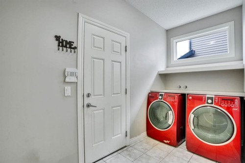 117 Hawkmere Place, Chestermere, AB - Indoor Photo Showing Laundry Room