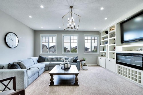 117 Hawkmere Place, Chestermere, AB - Indoor Photo Showing Living Room