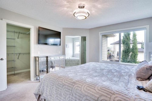117 Hawkmere Place, Chestermere, AB - Indoor Photo Showing Bedroom