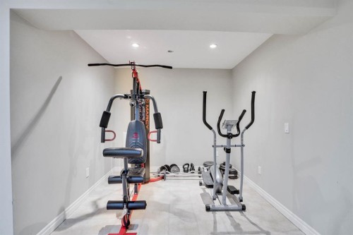117 Hawkmere Place, Chestermere, AB - Indoor Photo Showing Gym Room