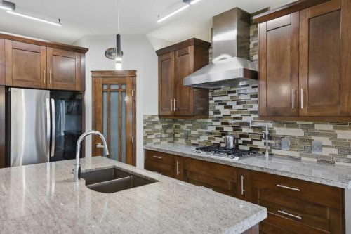 129 Cranfield Green Se, Calgary, AB - Indoor Photo Showing Kitchen With Double Sink With Upgraded Kitchen