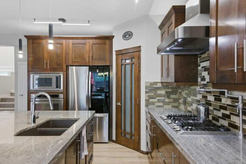 129 Cranfield Green Se, Calgary, AB - Indoor Photo Showing Kitchen With Double Sink With Upgraded Kitchen