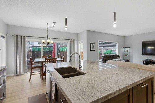 129 Cranfield Green Se, Calgary, AB - Indoor Photo Showing Kitchen With Double Sink