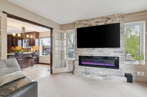 48 Westridge Drive, Okotoks, AB - Indoor Photo Showing Living Room With Fireplace