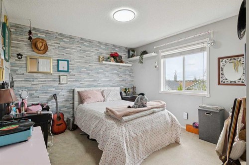 48 Westridge Drive, Okotoks, AB - Indoor Photo Showing Bedroom