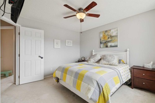 48 Westridge Drive, Okotoks, AB - Indoor Photo Showing Bedroom