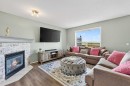 112 Chaparral Circle Se, Calgary, AB  - Indoor Photo Showing Living Room With Fireplace 