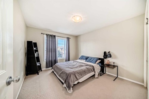 205-20 Panatella Landing Nw, Calgary, AB - Indoor Photo Showing Bedroom