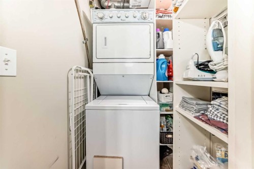 205-20 Panatella Landing Nw, Calgary, AB - Indoor Photo Showing Laundry Room