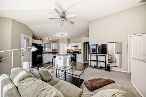 205-20 Panatella Landing Nw, Calgary, AB - Indoor Photo Showing Living Room