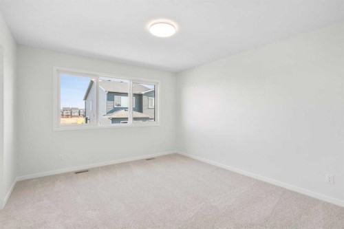 675 Buffaloberry Manor Se, Calgary, AB - Indoor Photo Showing Other Room
