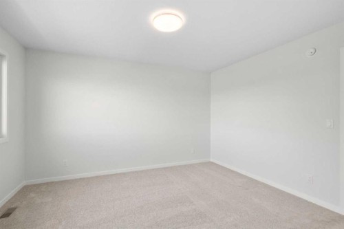 675 Buffaloberry Manor Se, Calgary, AB - Indoor Photo Showing Other Room