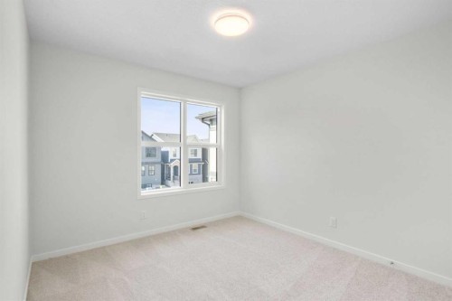 675 Buffaloberry Manor Se, Calgary, AB - Indoor Photo Showing Other Room