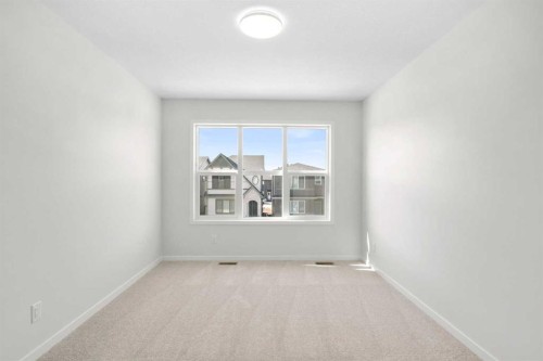675 Buffaloberry Manor Se, Calgary, AB - Indoor Photo Showing Other Room