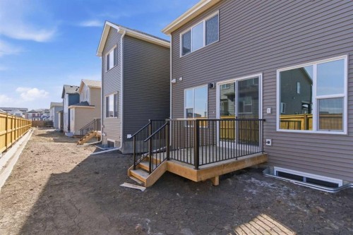 675 Buffaloberry Manor Se, Calgary, AB - Outdoor With Deck Patio Veranda With Exterior