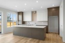 675 Buffaloberry Manor Se, Calgary, AB  - Indoor Photo Showing Kitchen 