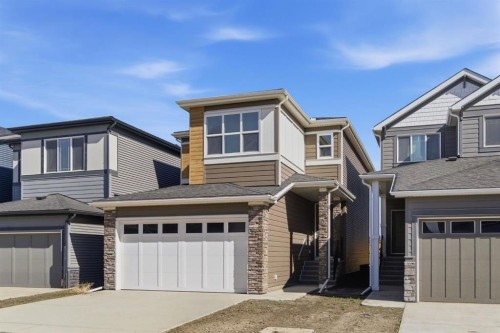 675 Buffaloberry Manor Se, Calgary, AB - Outdoor With Facade