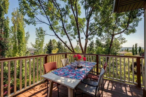 40 Springbank Bay Sw, Calgary, AB - Outdoor With Deck Patio Veranda