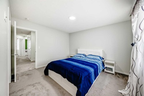 332 Dawson Drive, Chestermere, AB - Indoor Photo Showing Bedroom