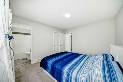 332 Dawson Drive, Chestermere, AB - Indoor Photo Showing Bedroom