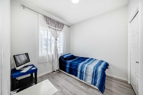 332 Dawson Drive, Chestermere, AB - Indoor Photo Showing Bedroom