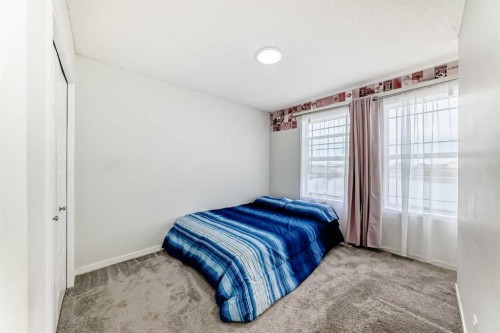 332 Dawson Drive, Chestermere, AB - Indoor Photo Showing Bedroom