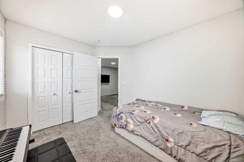 332 Dawson Drive, Chestermere, AB - Indoor Photo Showing Bedroom