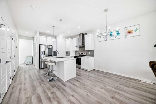 332 Dawson Drive, Chestermere, AB - Indoor Photo Showing Kitchen With Upgraded Kitchen