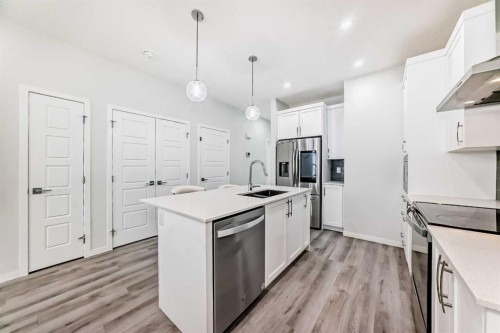 332 Dawson Drive, Chestermere, AB - Indoor Photo Showing Kitchen With Upgraded Kitchen