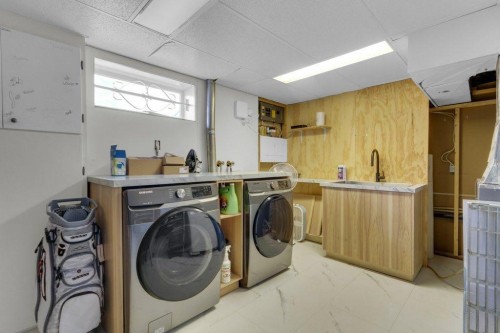 2728 45 Street Sw, Calgary, AB - Indoor Photo Showing Laundry Room