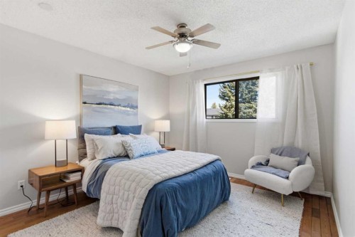 7 Jensen Crescent Ne, Airdrie, AB - Indoor Photo Showing Bedroom