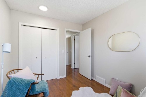 7 Jensen Crescent Ne, Airdrie, AB - Indoor Photo Showing Bedroom