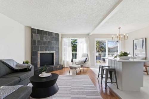 7 Jensen Crescent Ne, Airdrie, AB - Indoor Photo Showing Living Room