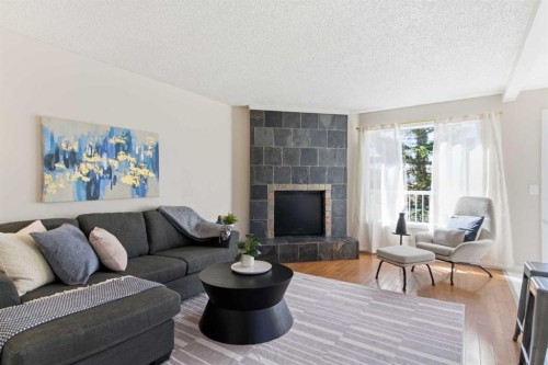 7 Jensen Crescent Ne, Airdrie, AB - Indoor Photo Showing Living Room