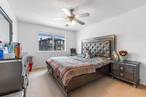 100 Saddlecrest Boulevard Ne, Calgary, AB - Indoor Photo Showing Bedroom