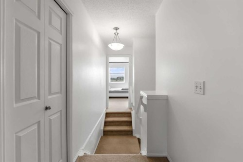 100 Saddlecrest Boulevard Ne, Calgary, AB - Indoor Photo Showing Other Room