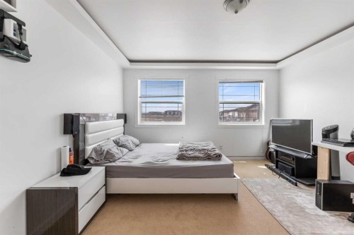 100 Saddlecrest Boulevard Ne, Calgary, AB - Indoor Photo Showing Bedroom