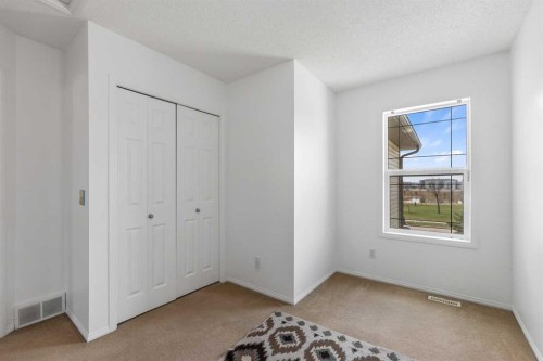 100 Saddlecrest Boulevard Ne, Calgary, AB - Indoor Photo Showing Other Room