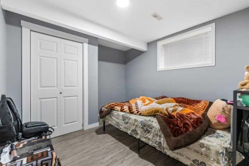 100 Saddlecrest Boulevard Ne, Calgary, AB - Indoor Photo Showing Bedroom
