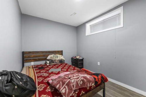 100 Saddlecrest Boulevard Ne, Calgary, AB - Indoor Photo Showing Bedroom