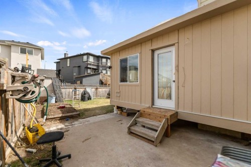 100 Saddlecrest Boulevard Ne, Calgary, AB - Outdoor With Exterior