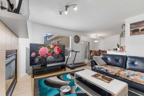 100 Saddlecrest Boulevard Ne, Calgary, AB - Indoor Photo Showing Living Room