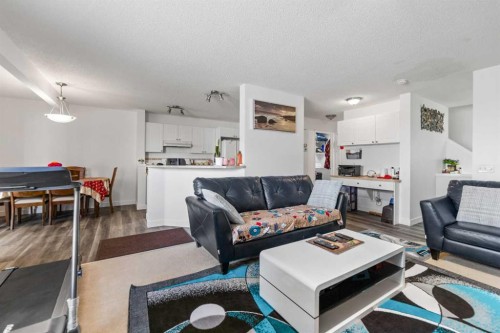 100 Saddlecrest Boulevard Ne, Calgary, AB - Indoor Photo Showing Living Room