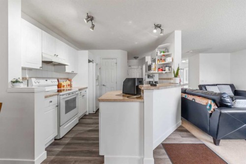100 Saddlecrest Boulevard Ne, Calgary, AB - Indoor Photo Showing Kitchen