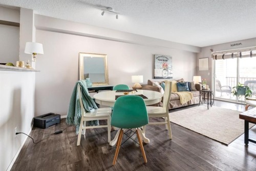 1414-12 Cimarron Common, Okotoks, AB - Indoor Photo Showing Living Room